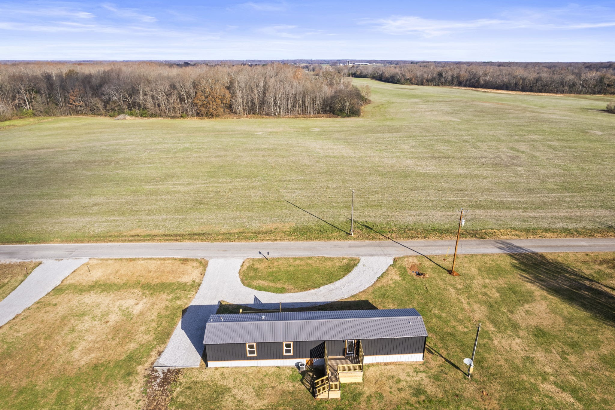 a view of a swimming pool and an outdoor seating