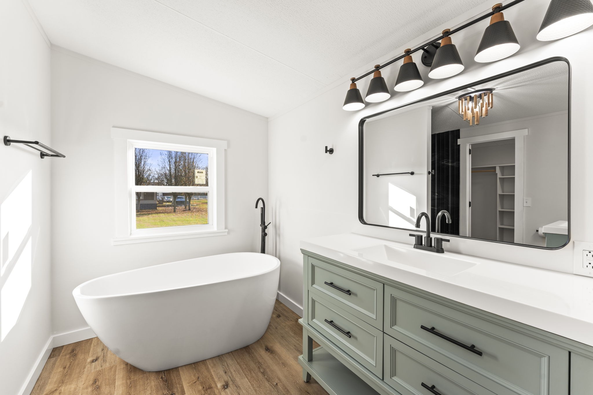 769 Stewart Road Huntland, TN 37345 - Photo 17 of 52 a bathroom with a bathtub and a sink