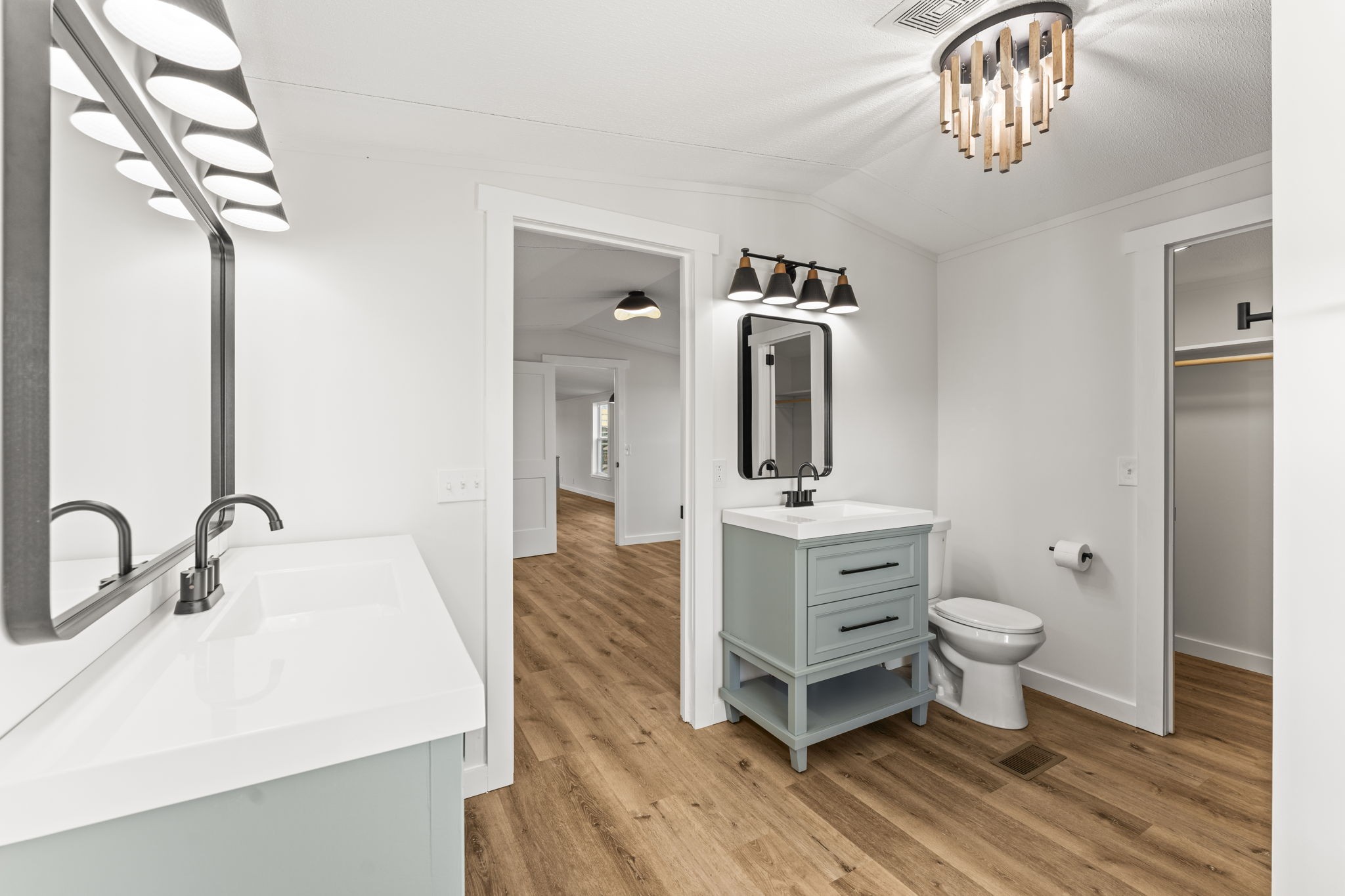 769 Stewart Road Huntland, TN 37345 - Photo 19 of 52 a bathroom with a sink a toilet and mirror