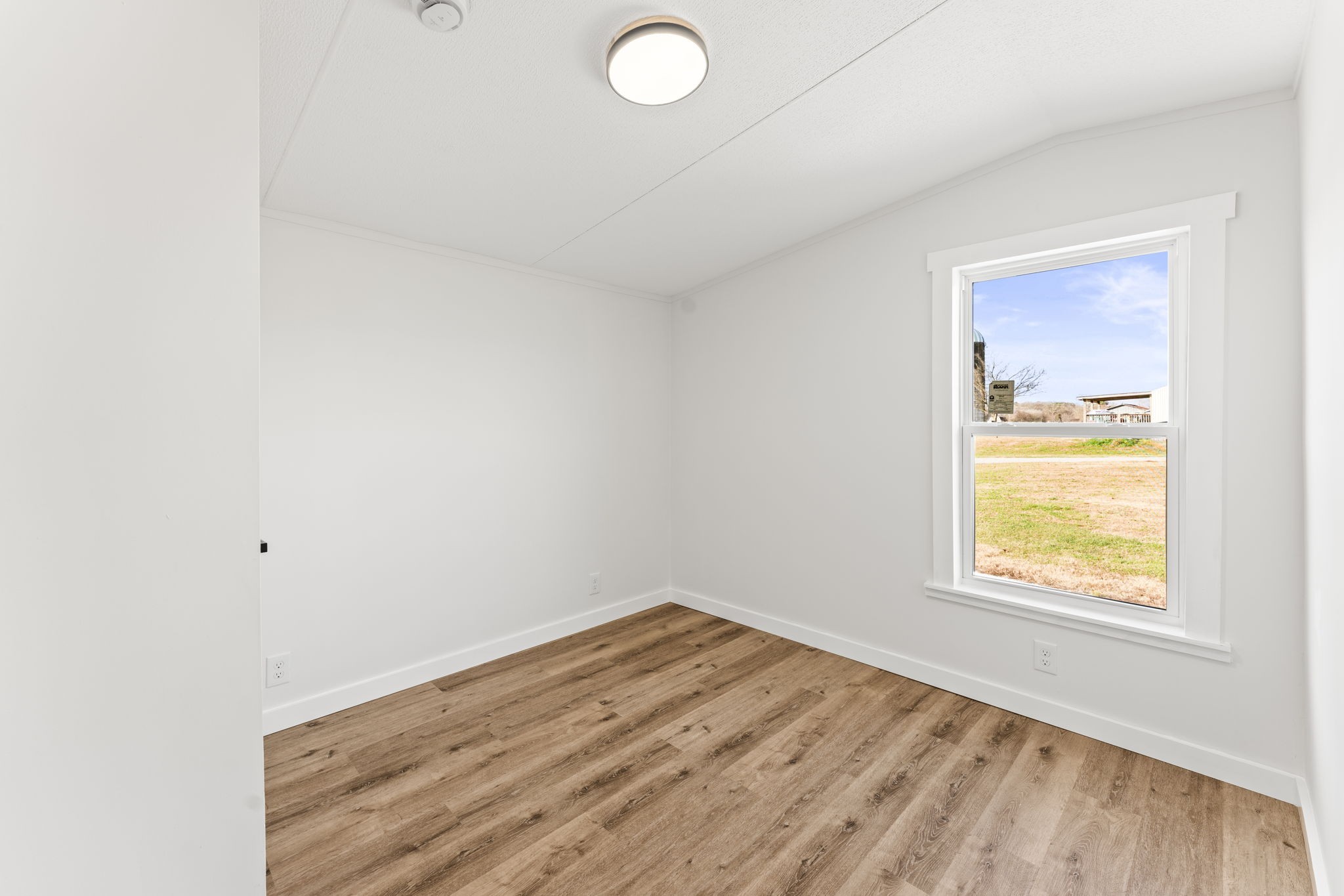 769 Stewart Road Huntland, TN 37345 - Photo 23 of 52 an empty room with a window
