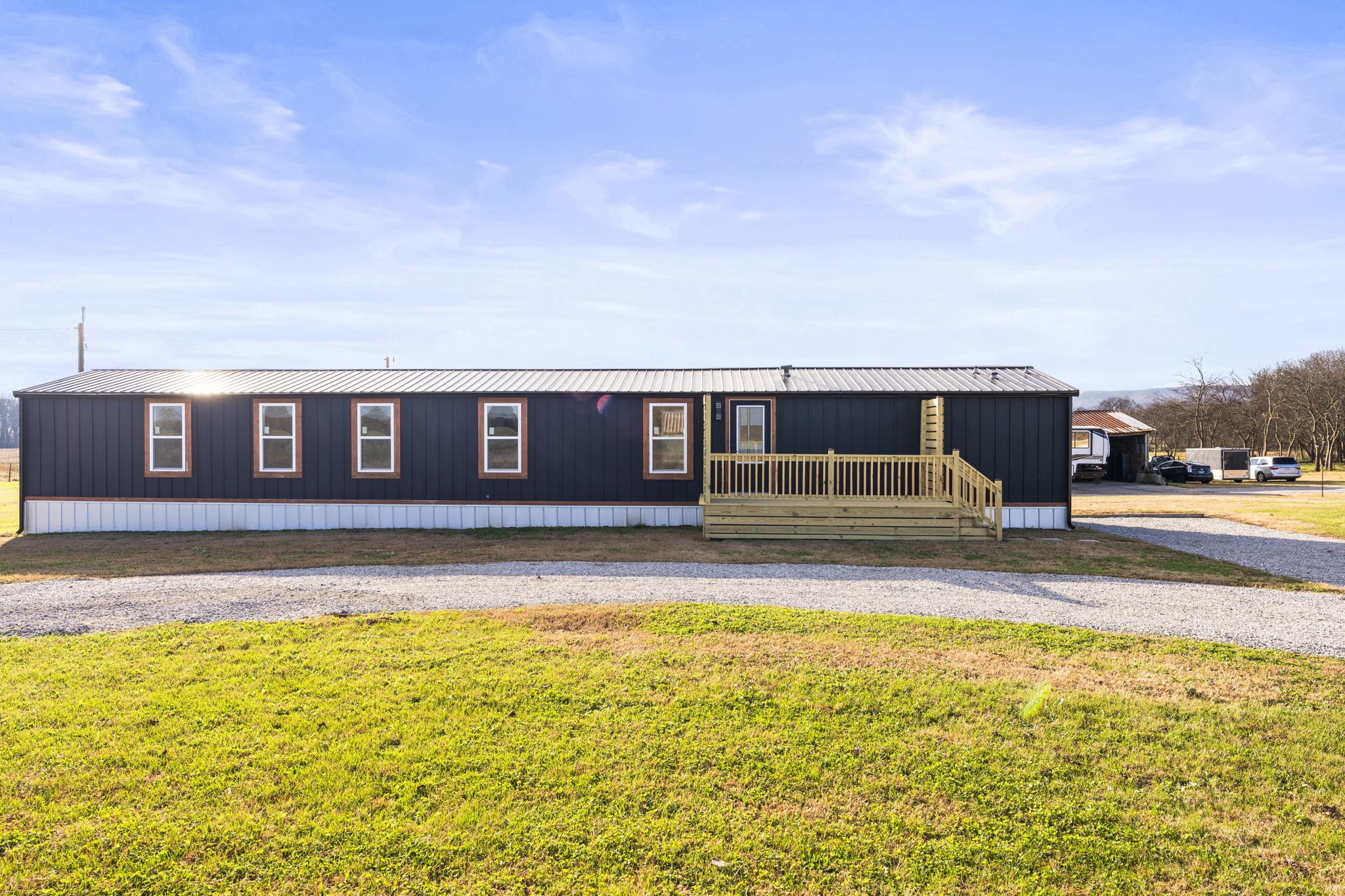769 Stewart Road Huntland, TN 37345 - Photo 28 of 52 a front view of a house with a yard