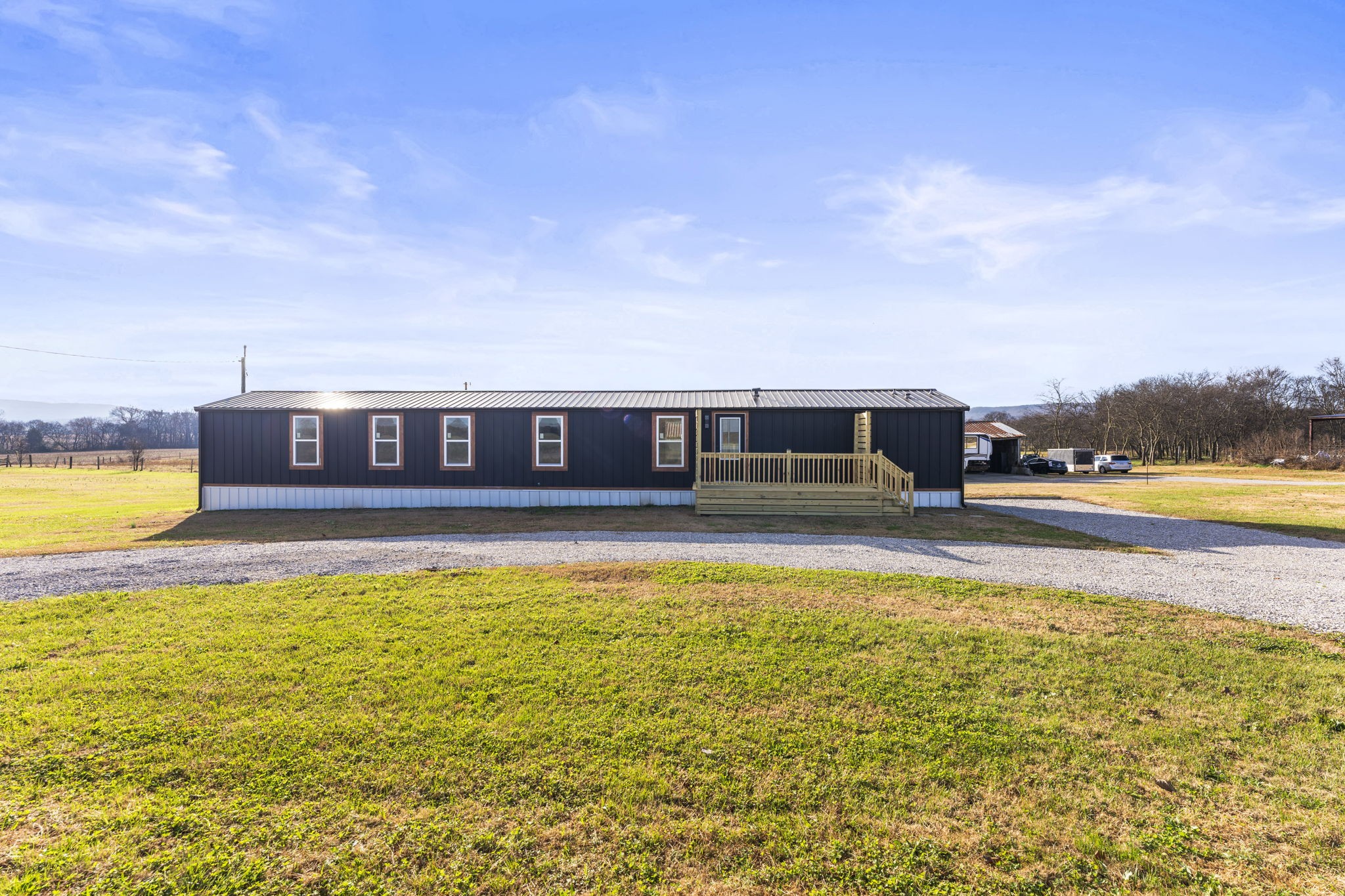 769 Stewart Road Huntland, TN 37345 - Photo 29 of 52 a view of a swimming pool with an outdoor space and seating area