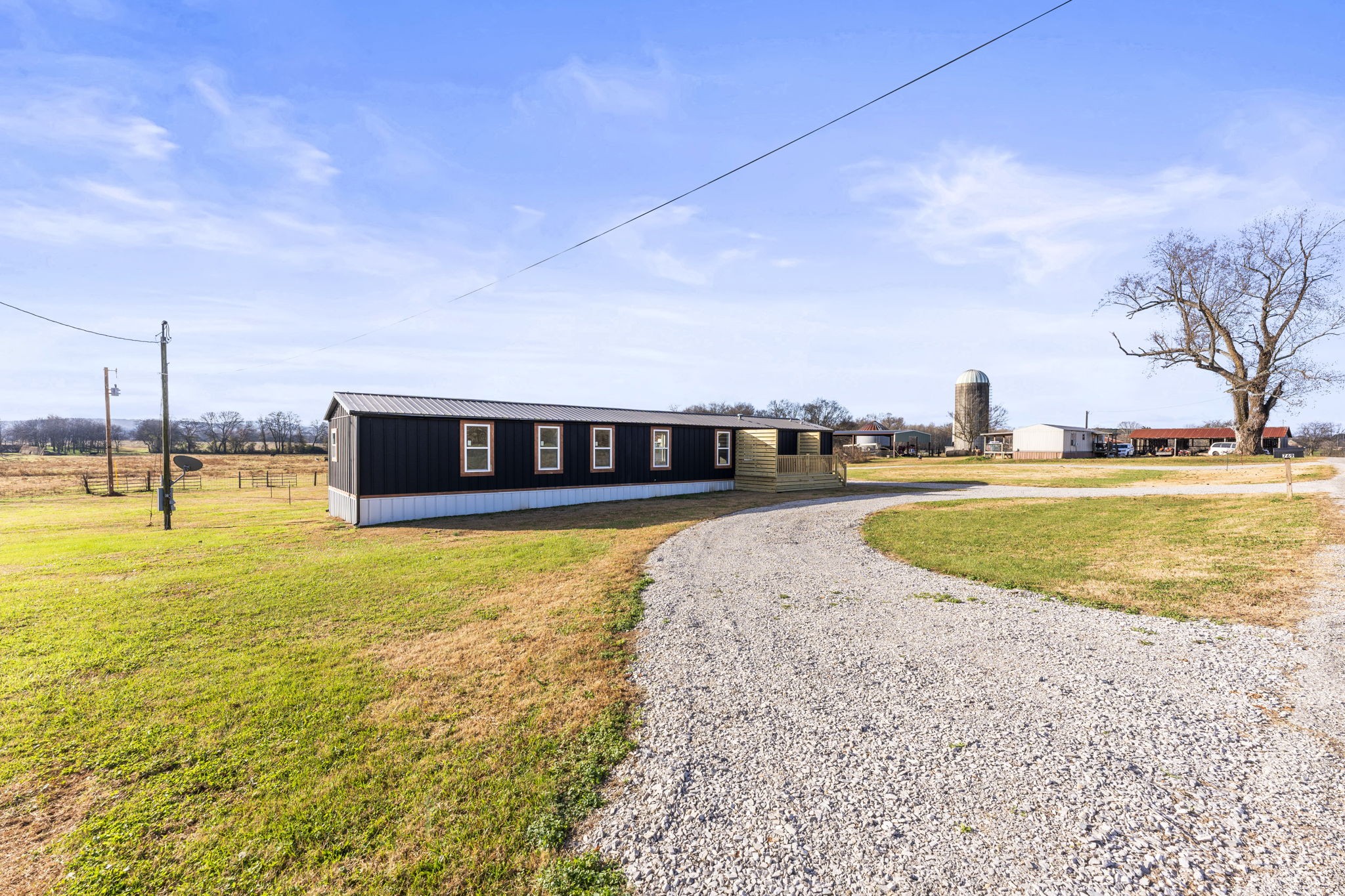 769 Stewart Road Huntland, TN 37345 - Photo 30 of 52 a view of a swimming pool with an outdoor seating