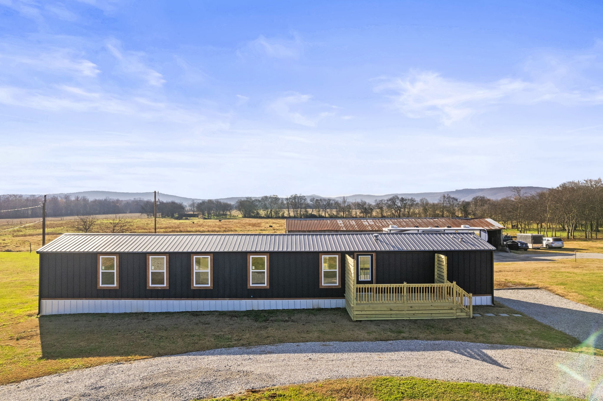 769 Stewart Road Huntland, TN 37345 - Photo 34 of 52 a view of a swimming pool and an outdoor seating