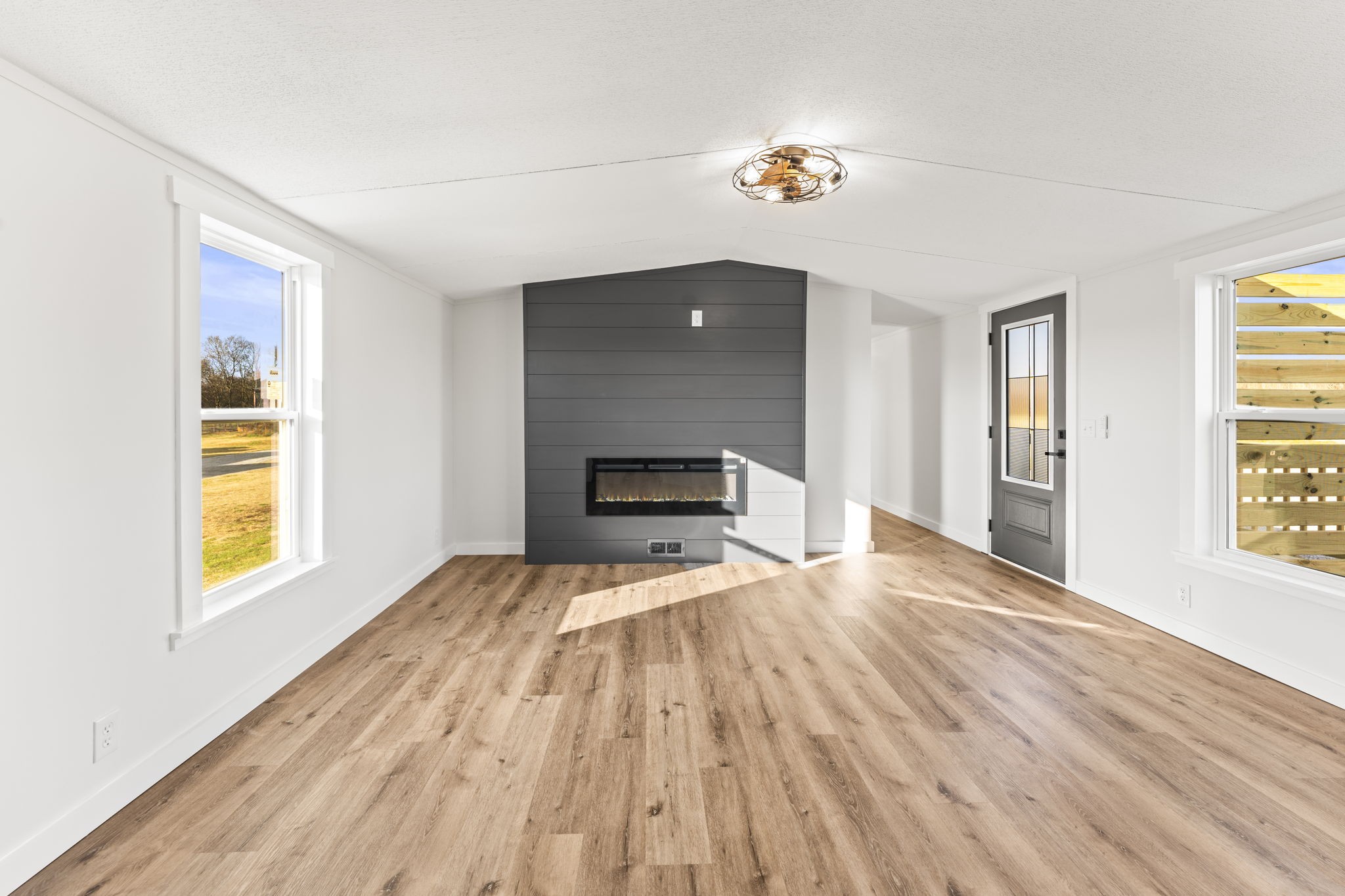 769 Stewart Road Huntland, TN 37345 - Photo 4 of 52 a view of empty room with wooden floor and fan