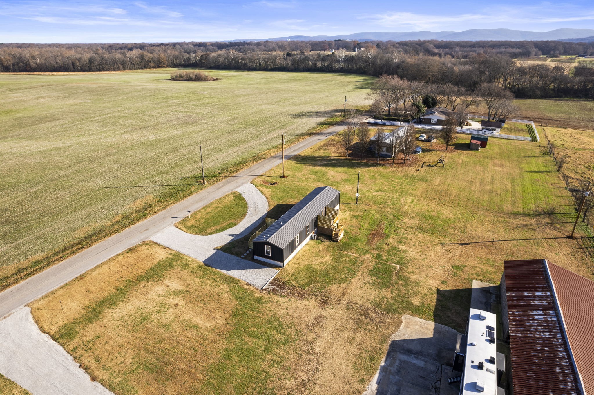 769 Stewart Road Huntland, TN 37345 - Photo 45 of 52 a view of a lake with a mountain