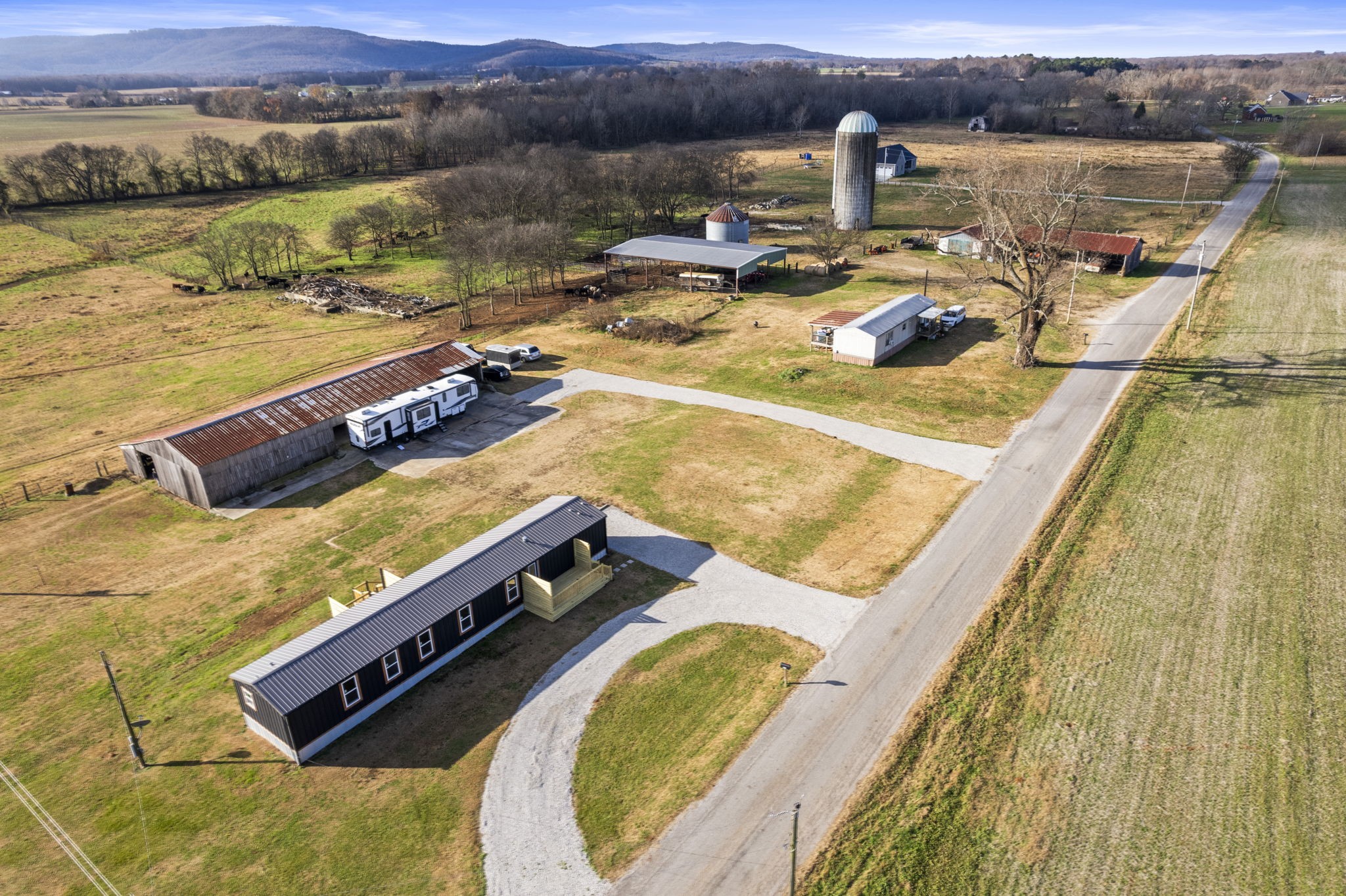 769 Stewart Road Huntland, TN 37345 - Photo 48 of 52 a view of a swimming pool with a table and chairs