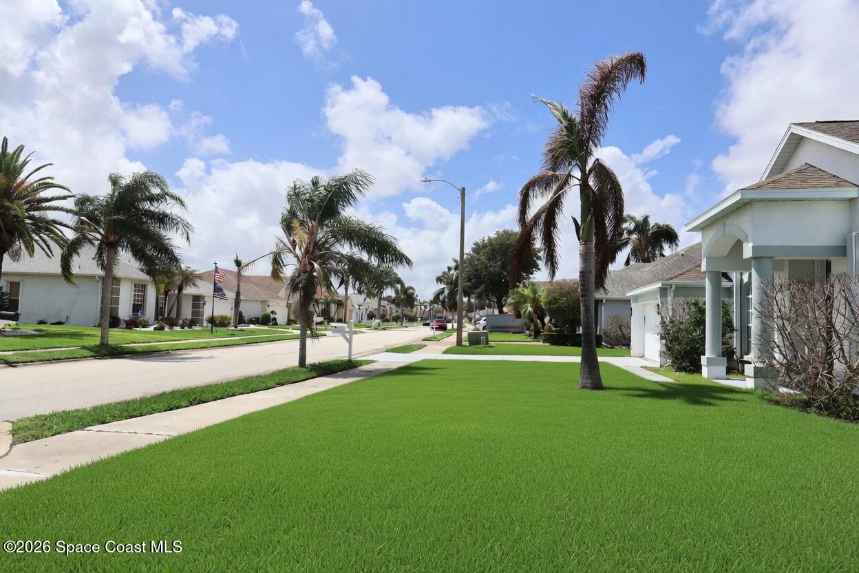 704 Carriage Hill Road Melbourne, FL 32940 - Photo 9 of 59 Street