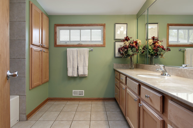 2209 Glenview Road Glenview, IL 60025 - Photo 4 of 7 a kitchen with a sink and cabinets