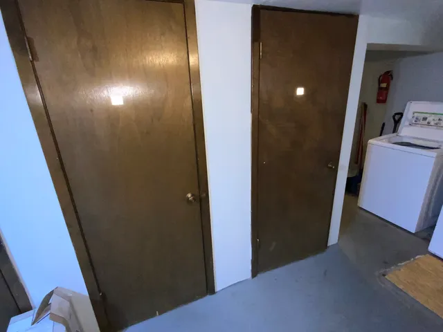 a view of a storage & utility room with washer and dryer