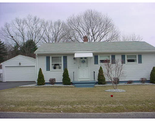 38 Regal Street Springfield, MA 01118 - Photo 1 of 14 front view of a house with a yard