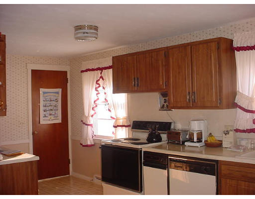38 Regal Street Springfield, MA 01118 - Photo 5 of 14 a kitchen with a sink and cabinets