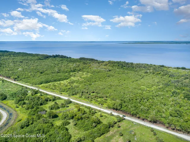 a view of an outdoor space with a lake view