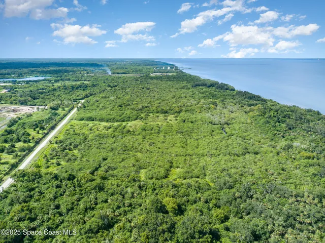 a view of a yard with an outdoor space