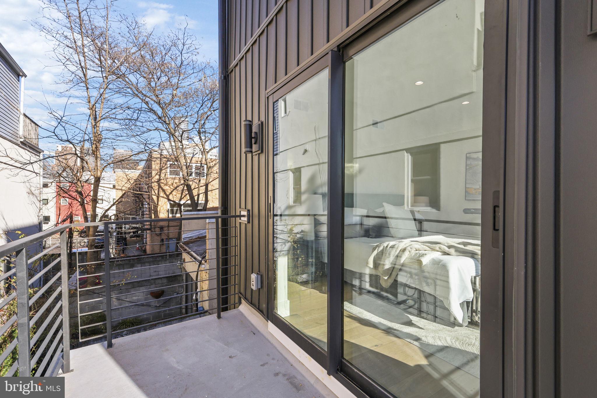 514 South 20th Street, Unit B Philadelphia, PA 19146 - Photo 16 of 52 a view of a glass door of the house