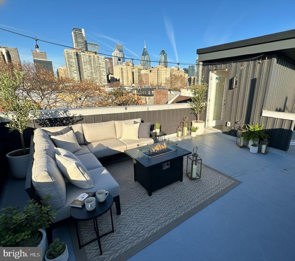 514 South 20th Street, Unit B Philadelphia, PA 19146 - Photo 38 of 52 a view of a balcony with chairs and a table