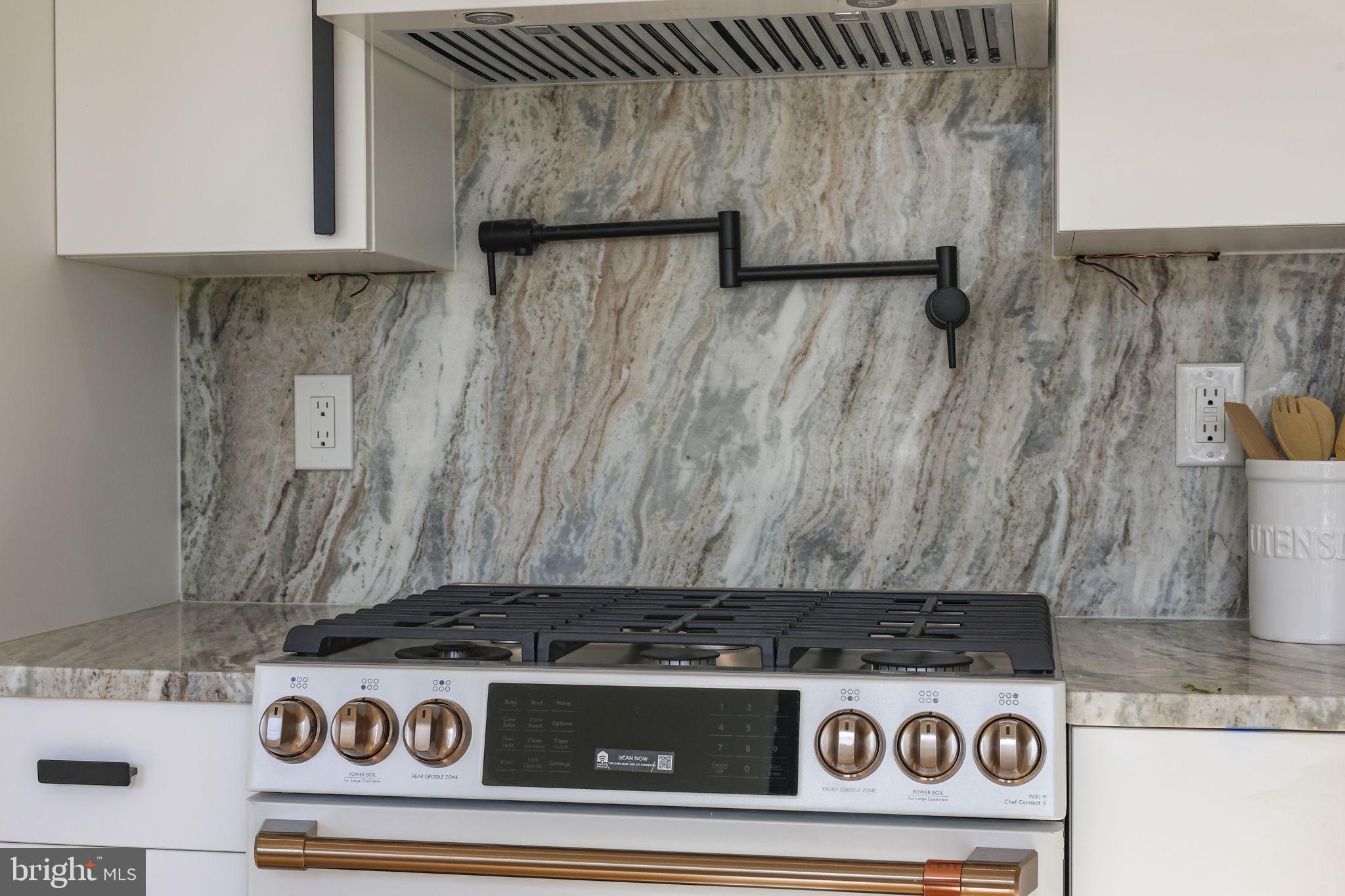 514 South 20th Street, Unit B Philadelphia, PA 19146 - Photo 6 of 52 a stove top oven sitting inside of a kitchen