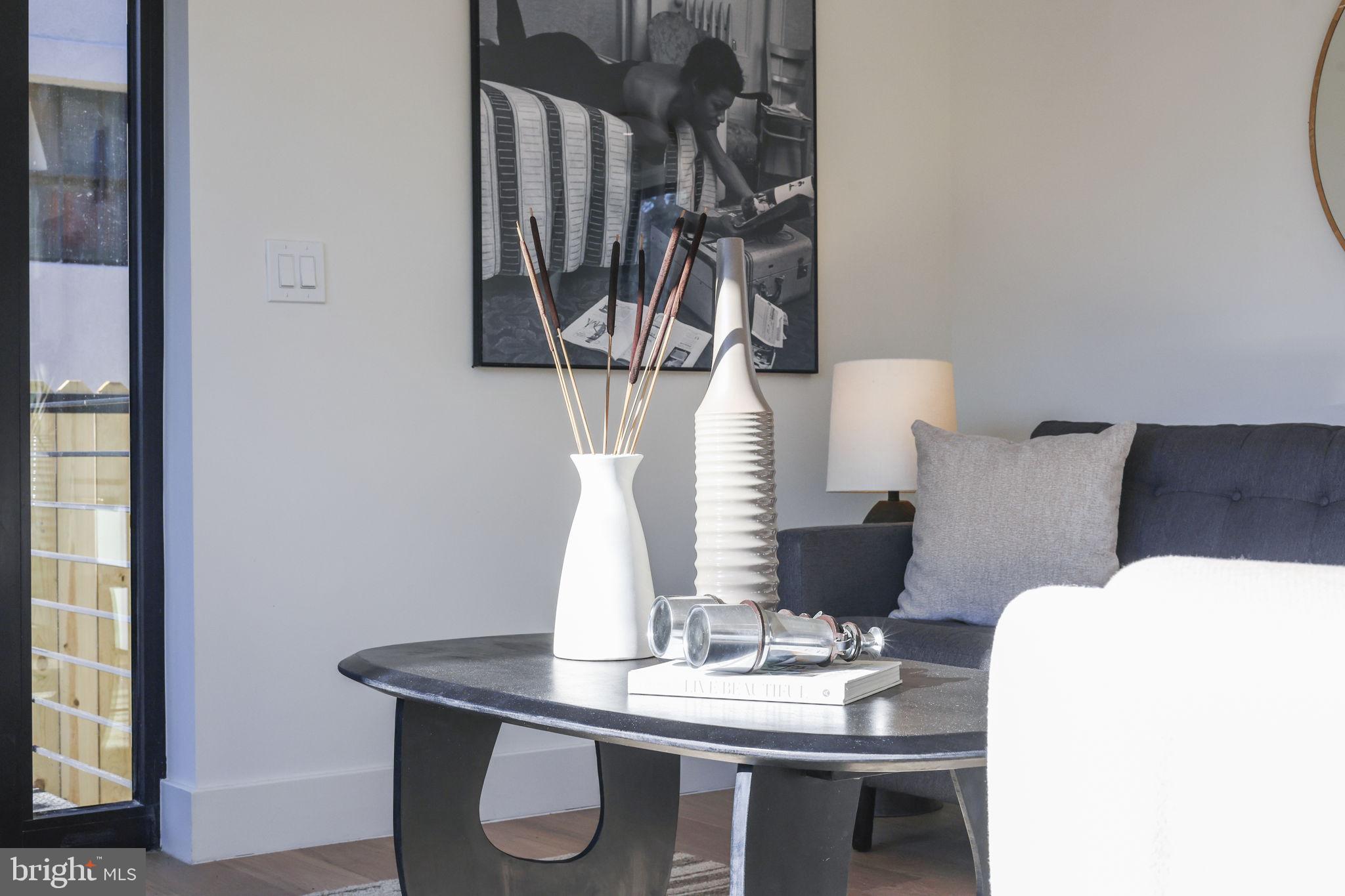 514 South 20th Street, Unit B Philadelphia, PA 19146 - Photo 8 of 52 a view of a dining room with furniture and wooden floor