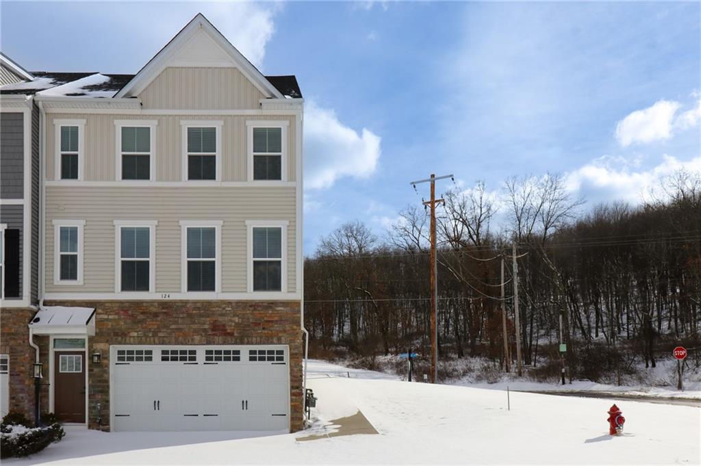 a street sign on a pole on a street