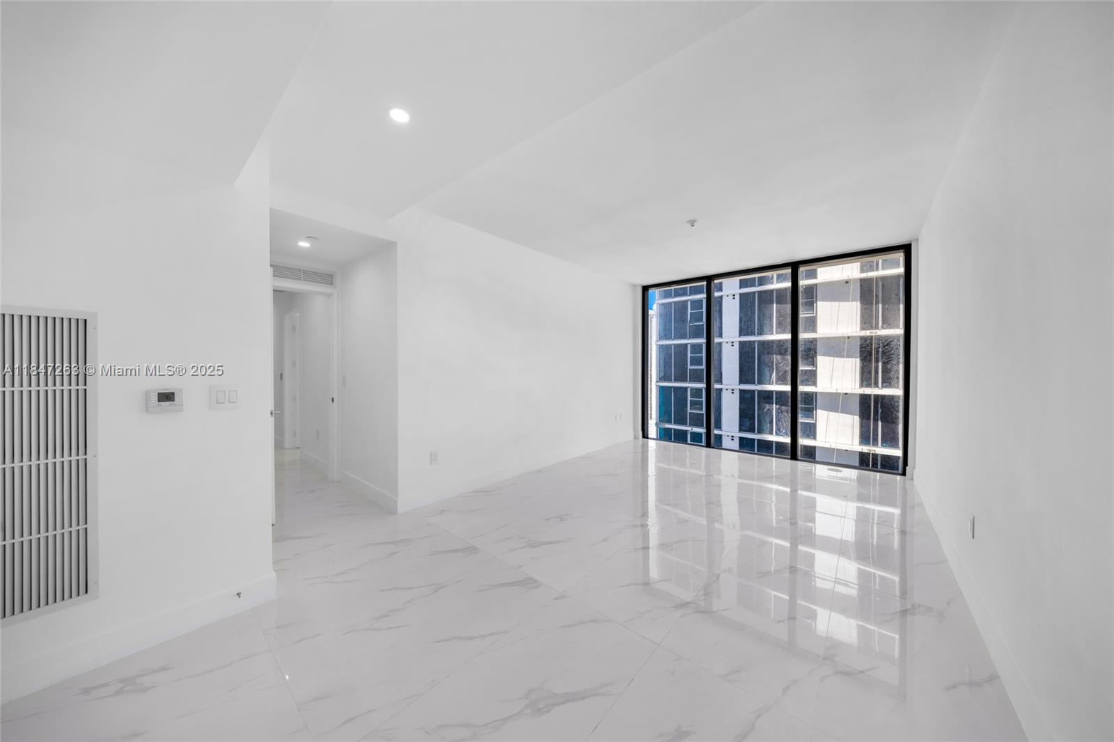 700 Northeast 24th Street, Unit 2101 Miami, FL 33137 - Photo 25 of 100 an empty room with a empty space and window