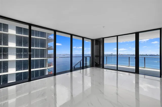 a front view of a building with glass windows