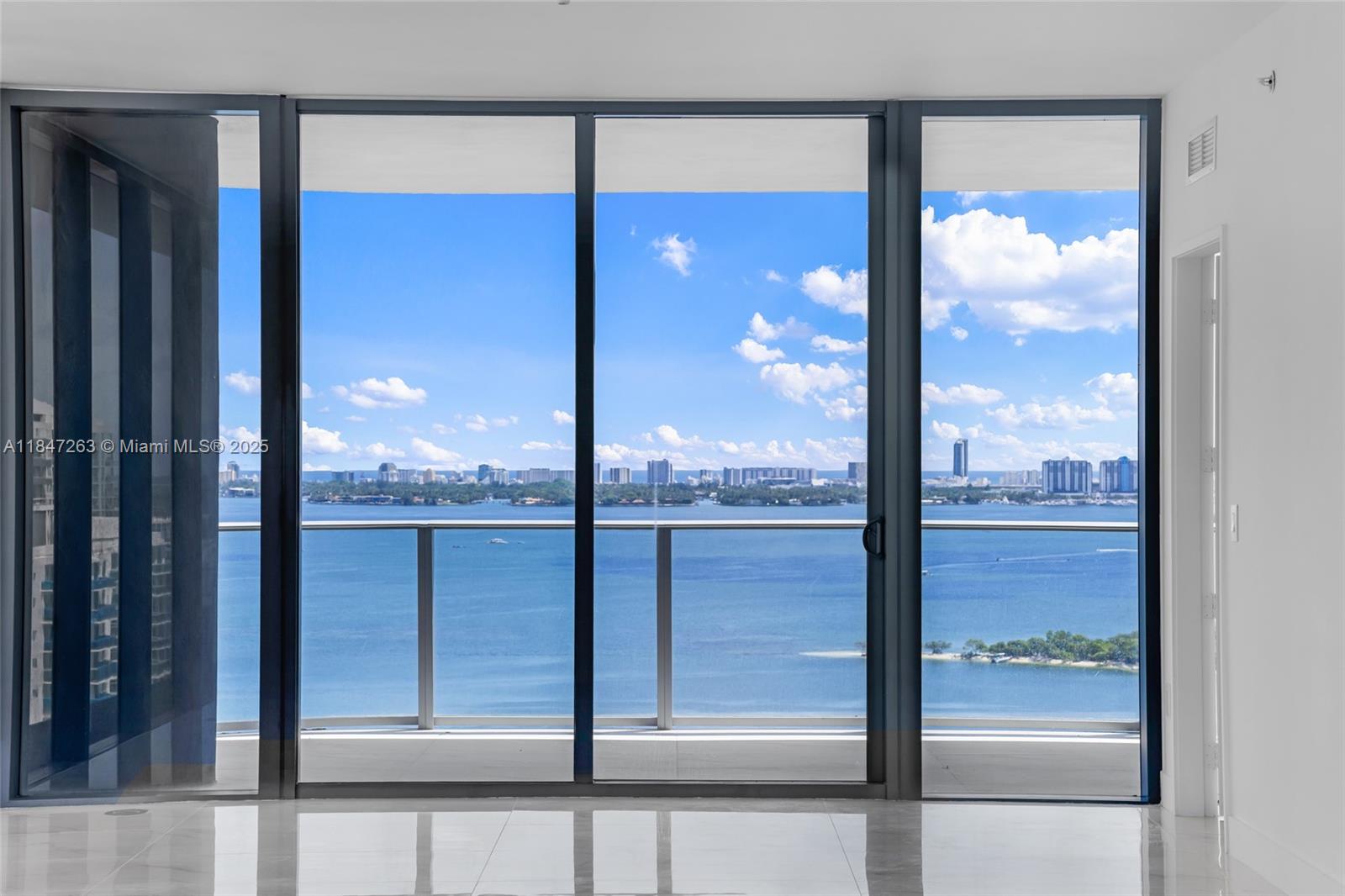 700 Northeast 24th Street, Unit 2101 Miami, FL 33137 - Photo 32 of 100 a view of a glass door with a from balcony