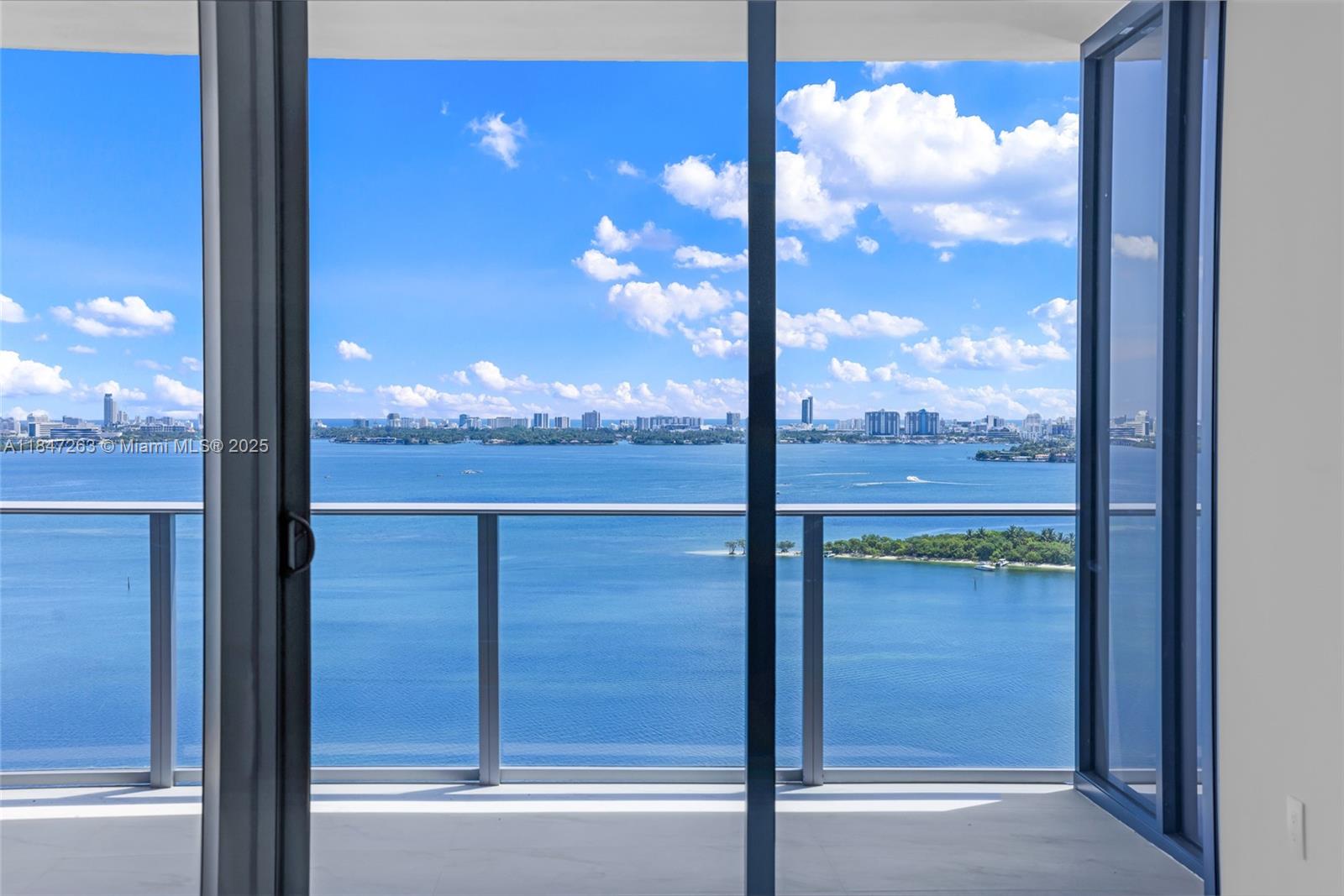 700 Northeast 24th Street, Unit 2101 Miami, FL 33137 - Photo 39 of 100 a view of a glass door with a from balcony