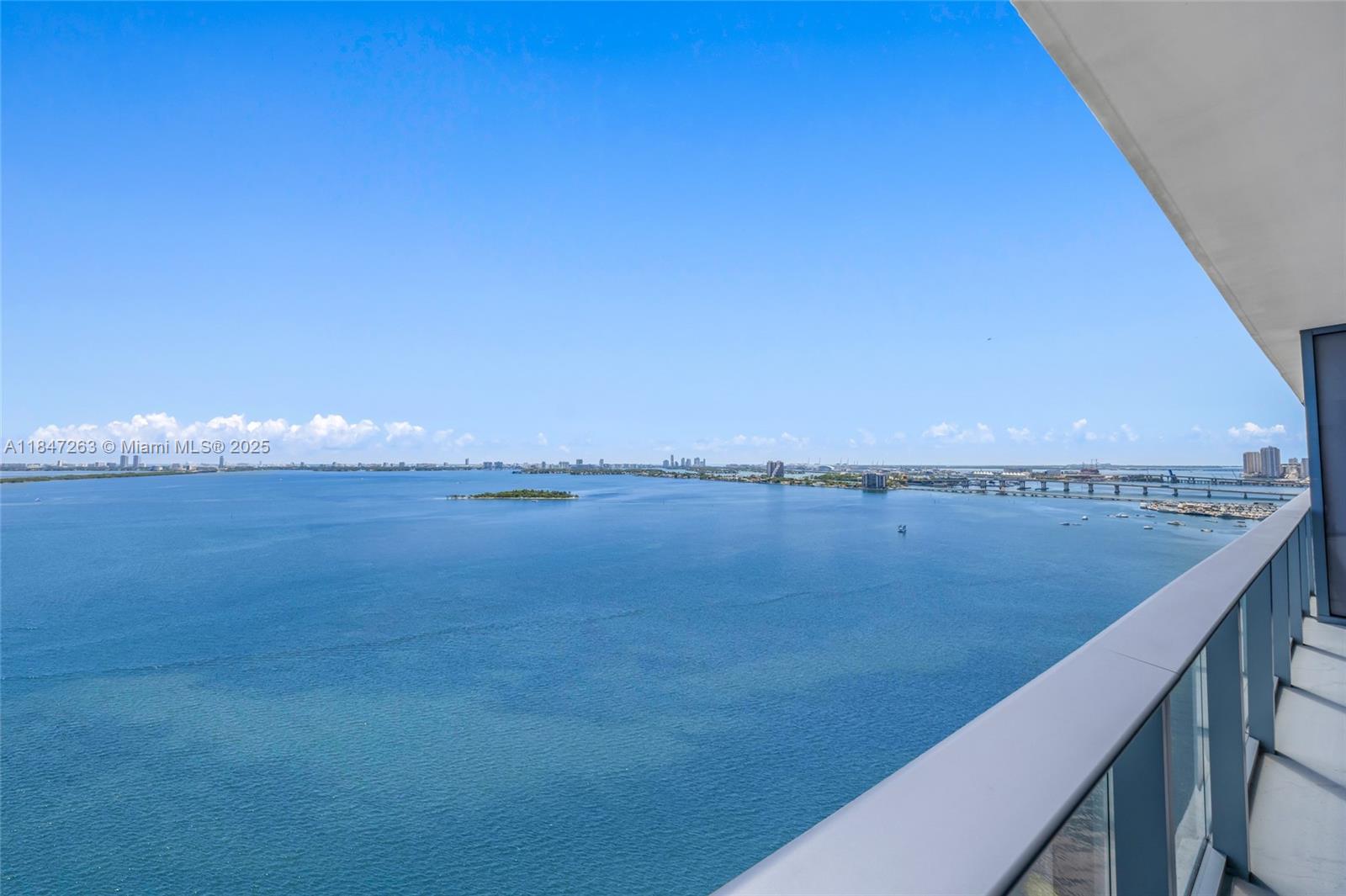 700 Northeast 24th Street, Unit 2101 Miami, FL 33137 - Photo 5 of 100 a view of a lake from a balcony