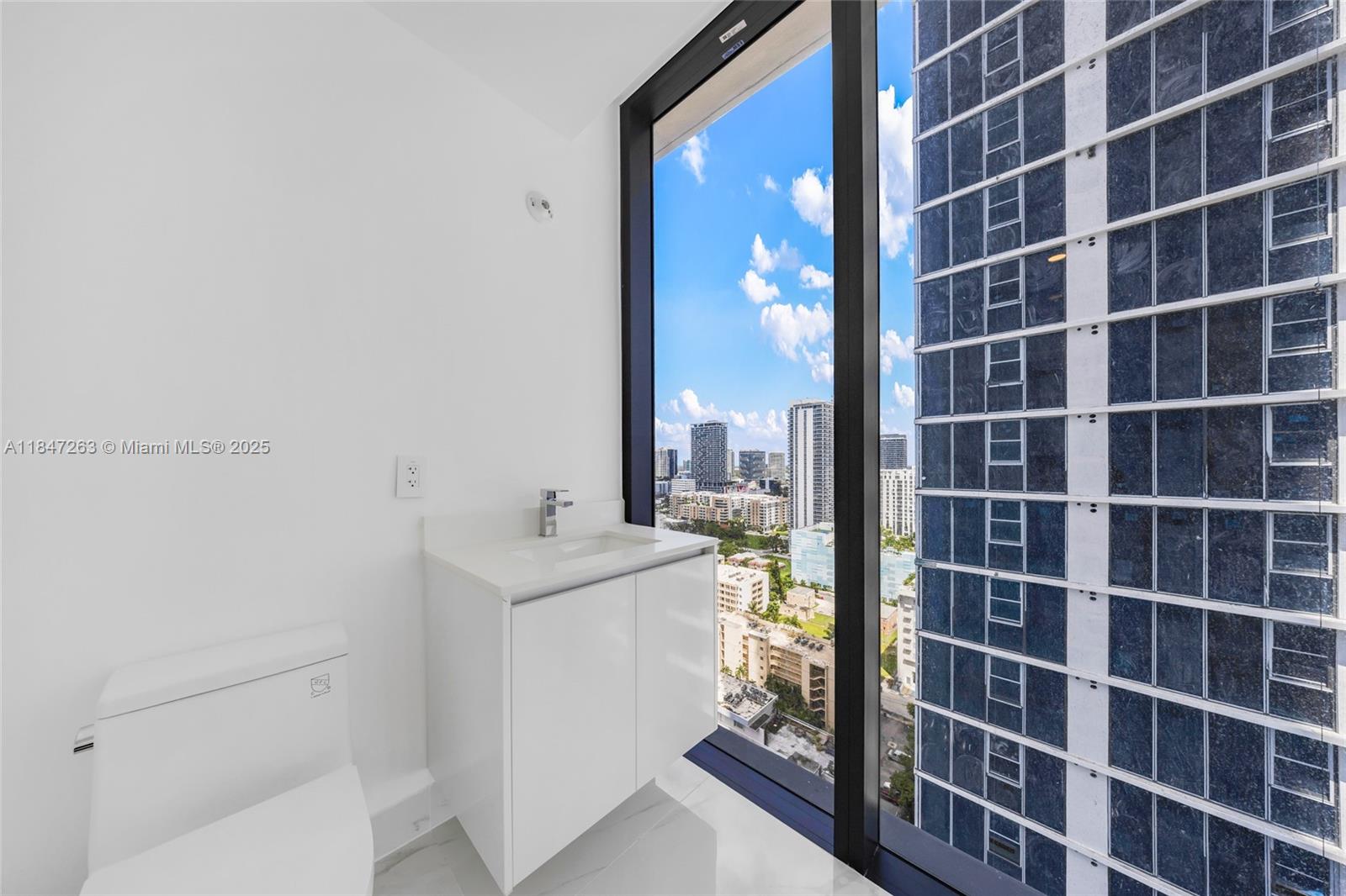 700 Northeast 24th Street, Unit 2101 Miami, FL 33137 - Photo 52 of 100 a view of a bathroom with a bathtub