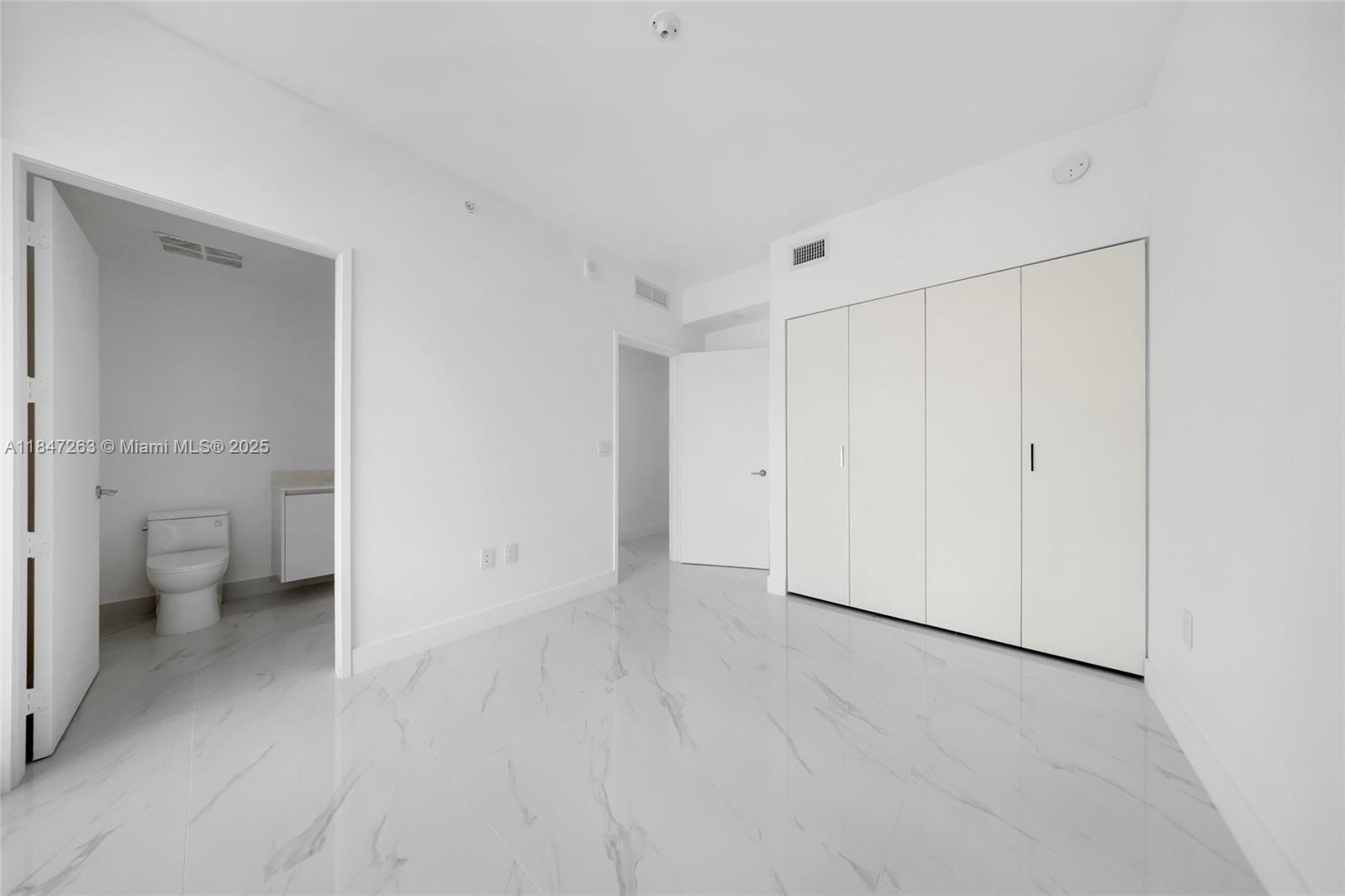 700 Northeast 24th Street, Unit 2101 Miami, FL 33137 - Photo 62 of 100 a view of a bathroom with a toilet