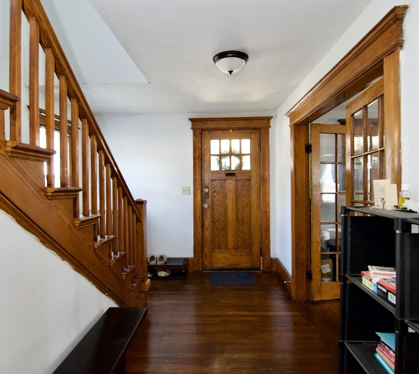 16 Amity Court Springfield, MA 01108 - Photo 4 of 42 a view of an entryway with wooden floor and windows