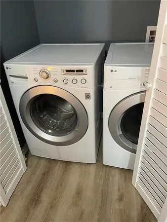 a utility room with dryer and washer
