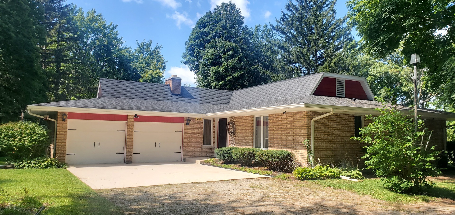 42W490 Kedeka Road Sugar Grove, IL 60554 - Photo 2 of 30 a front view of a house with a yard