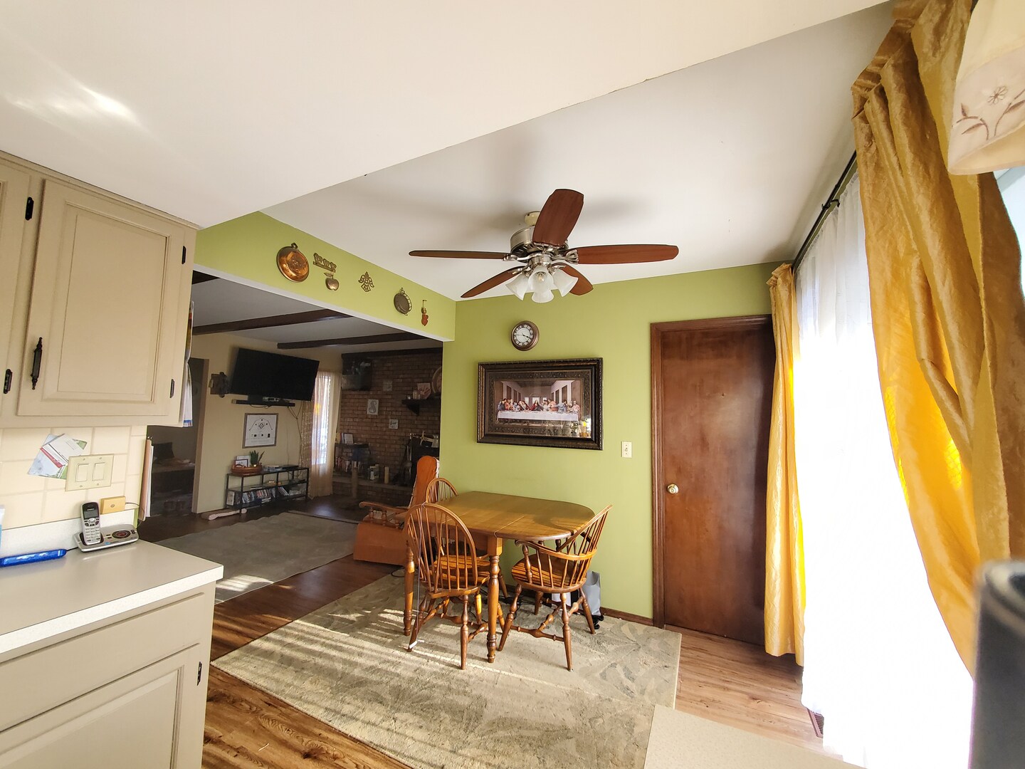 42W490 Kedeka Road Sugar Grove, IL 60554 - Photo 25 of 30 a living room with furniture and a large window