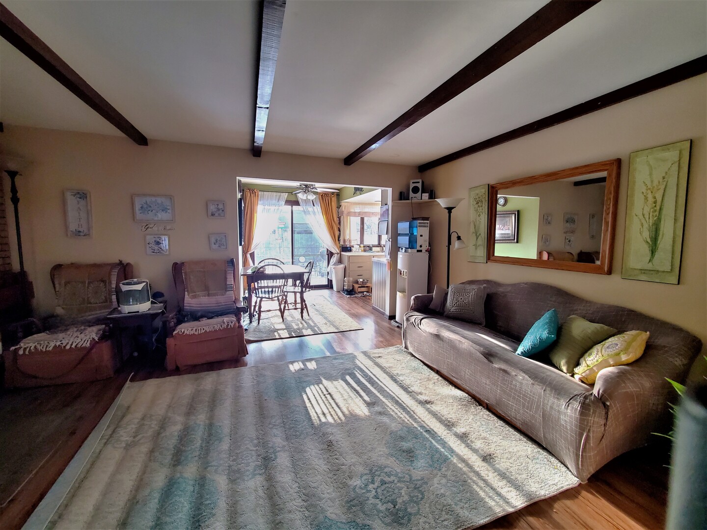 42W490 Kedeka Road Sugar Grove, IL 60554 - Photo 28 of 30 a living room with furniture and a wooden floor