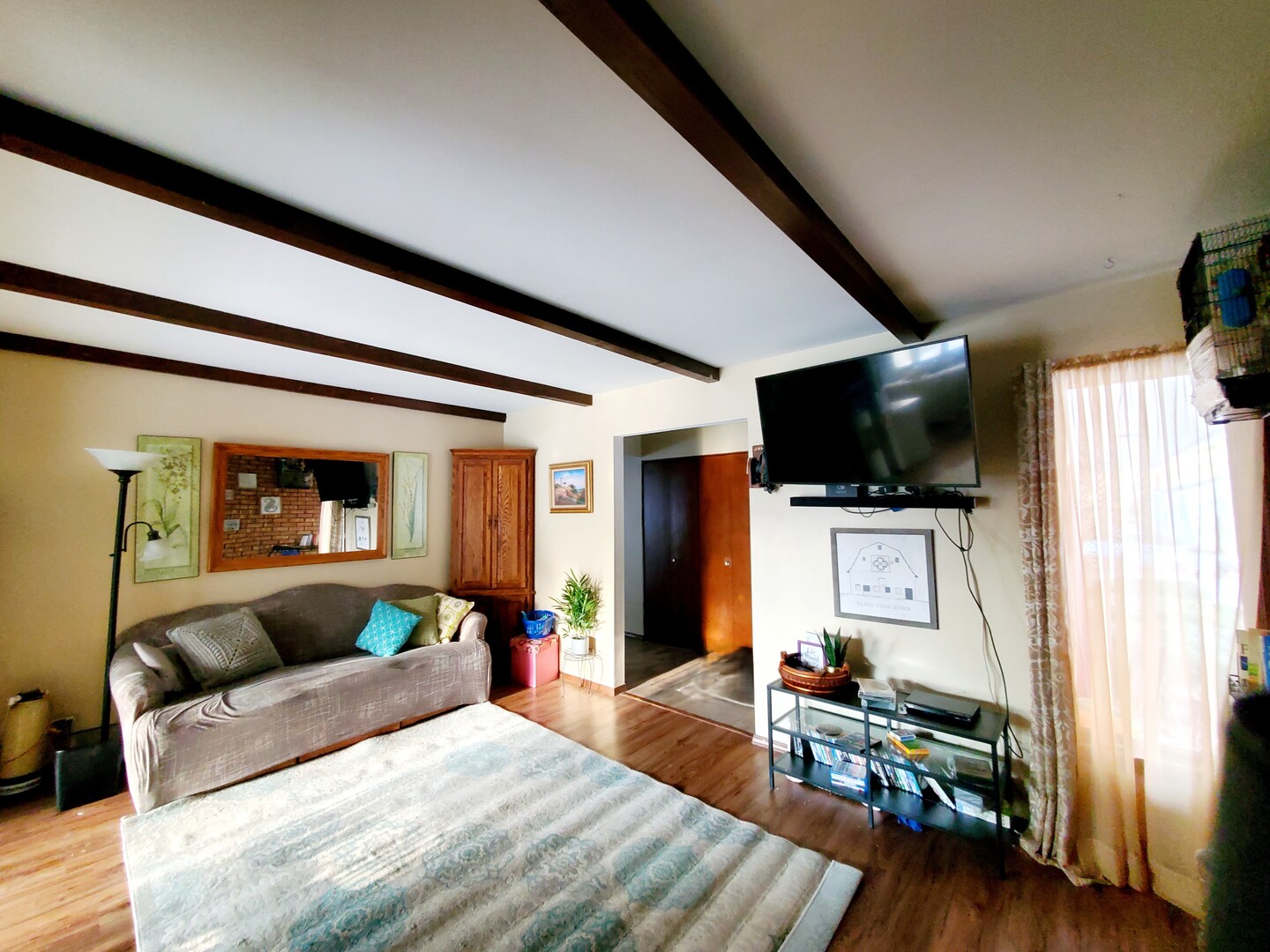 42W490 Kedeka Road Sugar Grove, IL 60554 - Photo 29 of 30 a bedroom with furniture and a flat screen tv