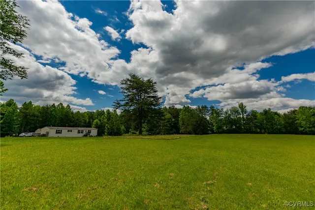a view of a garden and basketball court