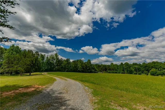 a view of a golf course with a swimming pool