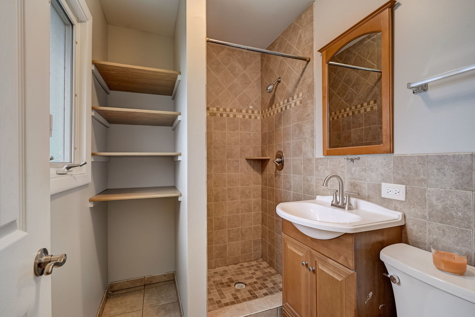 3132 Willow Road South Chicago Heights, IL 60411 - Photo 15 of 26 a bathroom with a sink and mirror