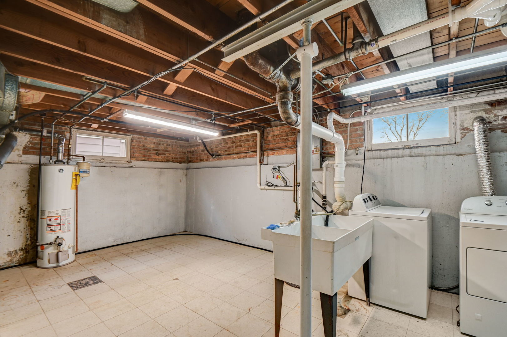 3132 Willow Road South Chicago Heights, IL 60411 - Photo 18 of 26 a view of a room with dryer and washer