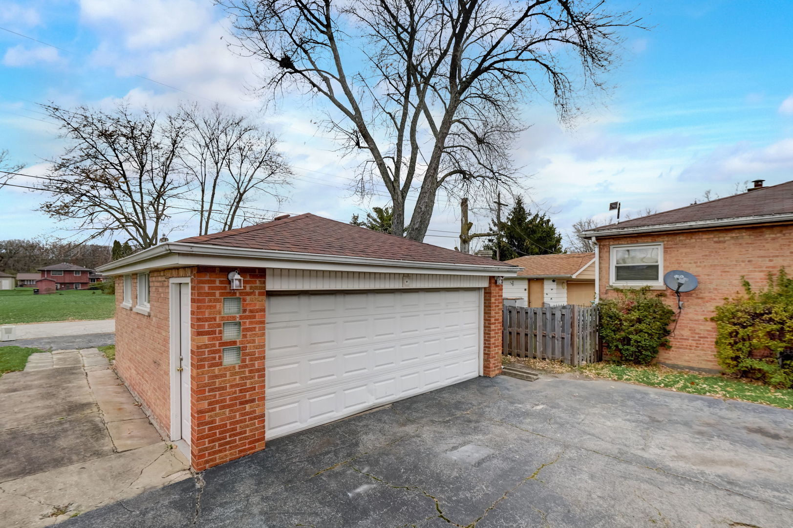 3132 Willow Road South Chicago Heights, IL 60411 - Photo 22 of 26 a front view of a house with garden