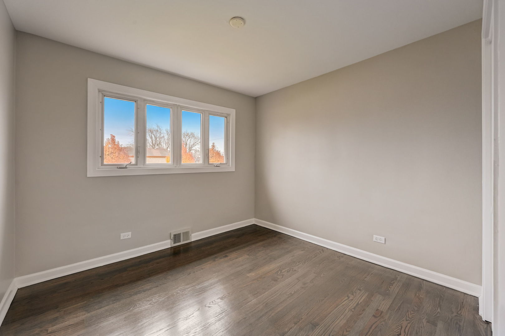3132 Willow Road South Chicago Heights, IL 60411 - Photo 10 of 26 an empty room with a window