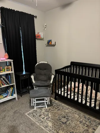 a room with furniture and a rug