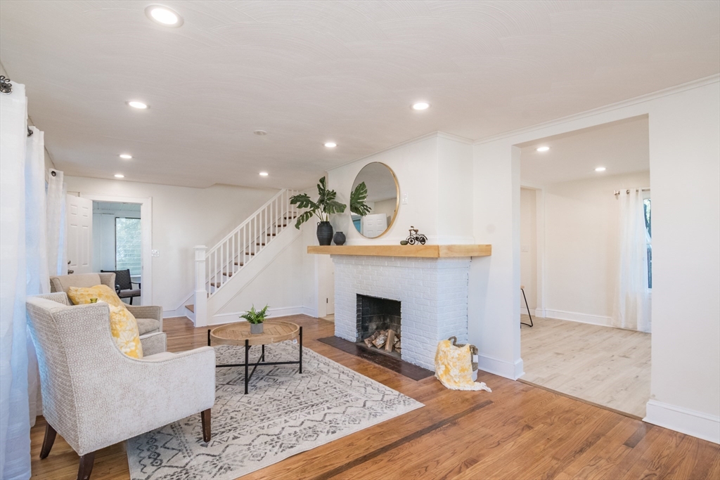 1235 Bay Street Springfield, MA 01109 - Photo 11 of 35 a living room with furniture and a fireplace