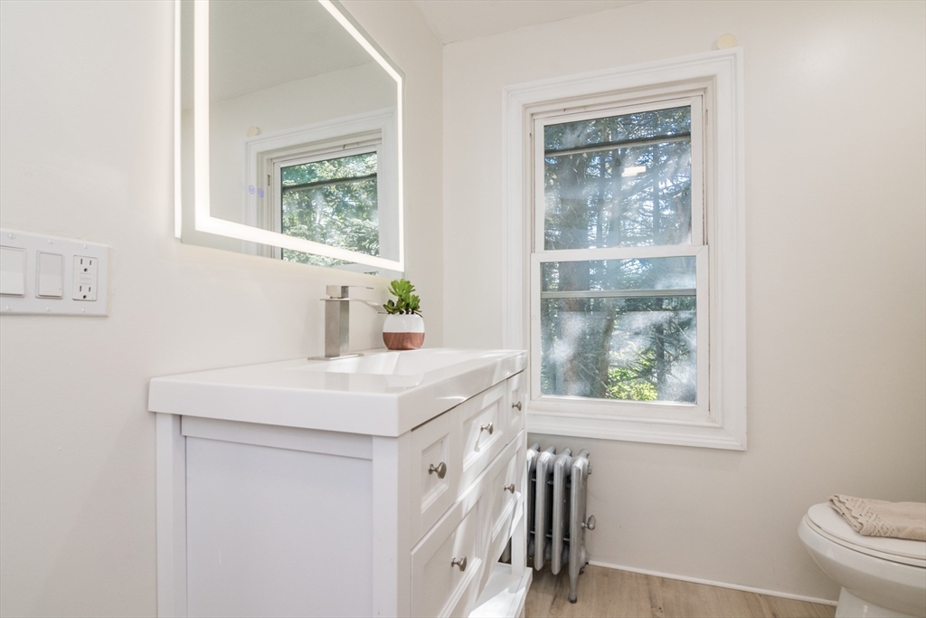 1235 Bay Street Springfield, MA 01109 - Photo 30 of 35 a utility room with a window a sink and a window