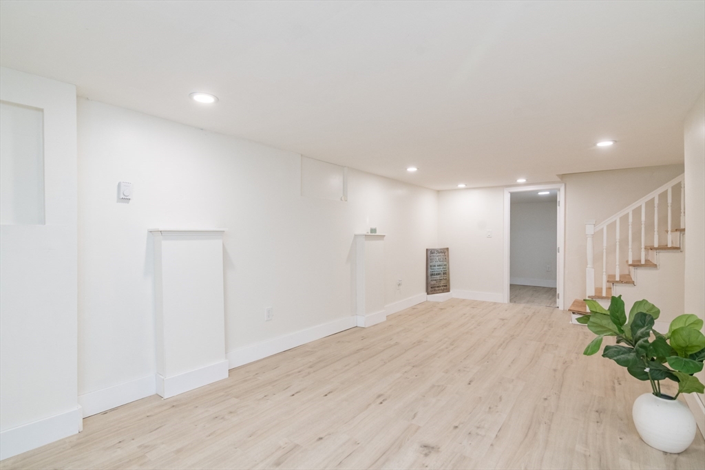 1235 Bay Street Springfield, MA 01109 - Photo 33 of 35 a view of a hallway with wooden floor