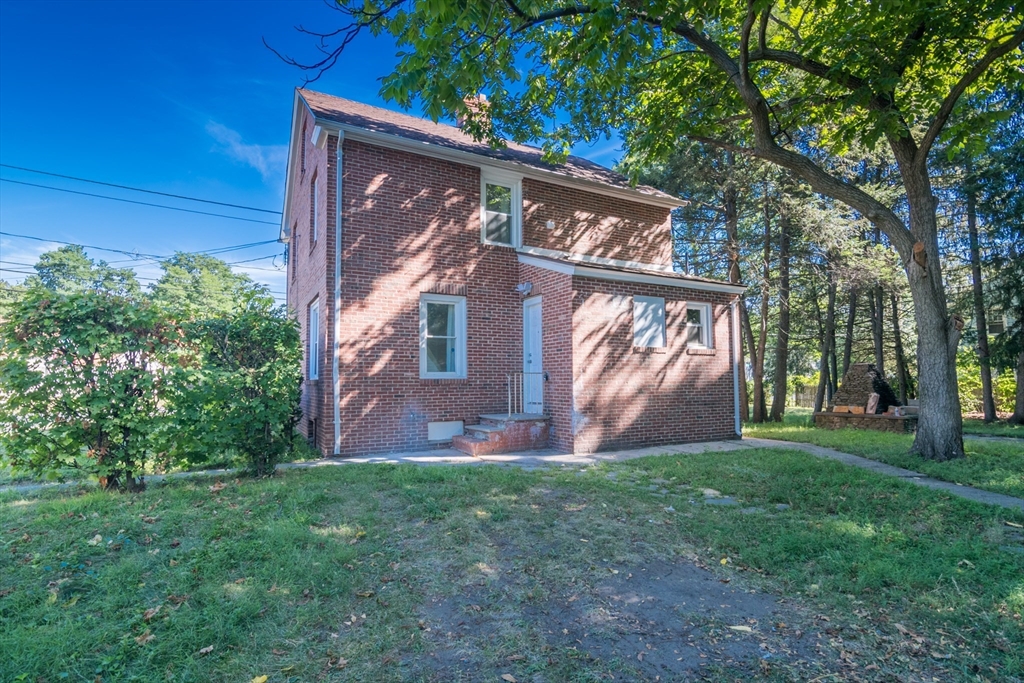 1235 Bay Street Springfield, MA 01109 - Photo 4 of 35 a view of a back yard of the house