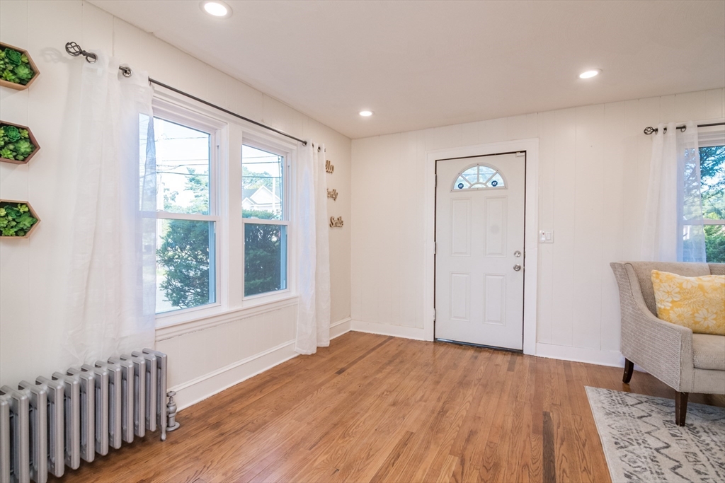 1235 Bay Street Springfield, MA 01109 - Photo 10 of 35 a view of empty room with wooden floor and fan
