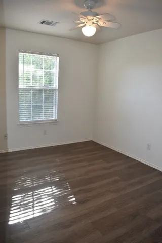 a house with trees in front of it