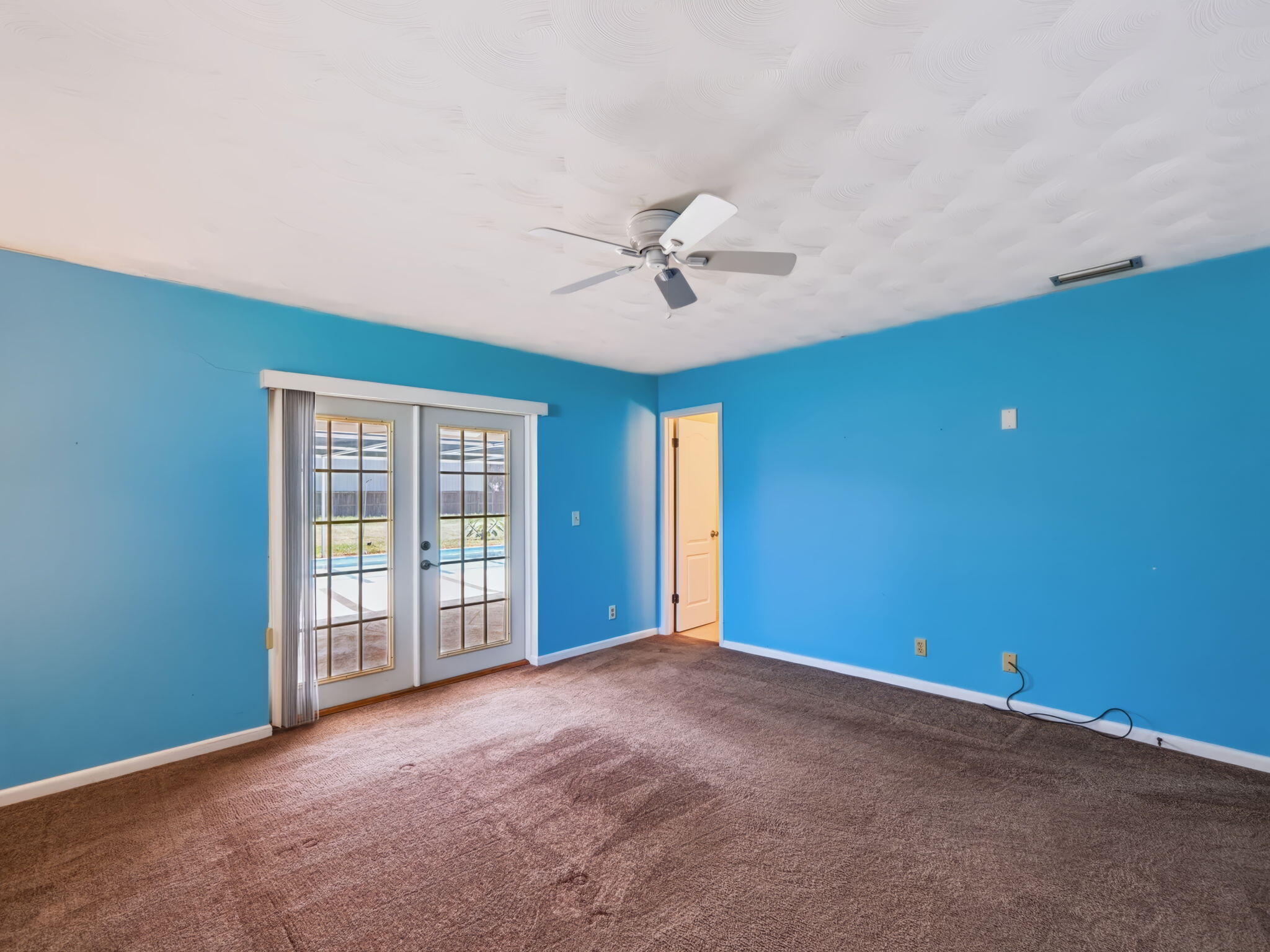 1550 Southwest Wildcat Trail Stuart, FL 34997 - Photo 19 of 37 Primary Bedroom